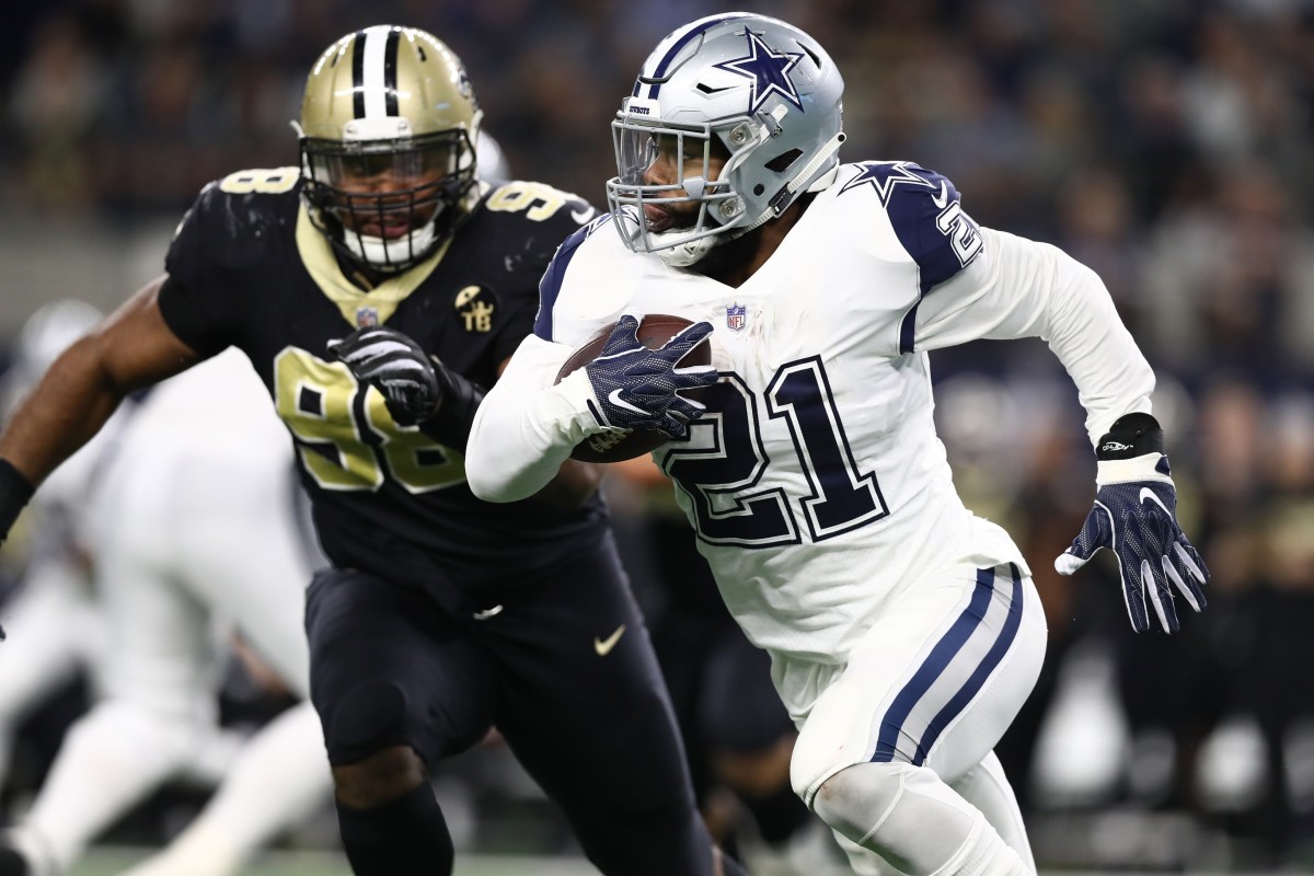 Dallas Cowboys running back Ezekiel Elliott (21) runs the ball against New Orleans. Mandatory Credit: Matthew Emmons-USA TODAY Sports